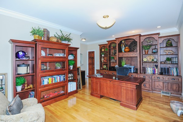 26 Cider Circle Bolton, MA 01740 - Photo 7 of 30 a living room with furniture cabinets and book shelf