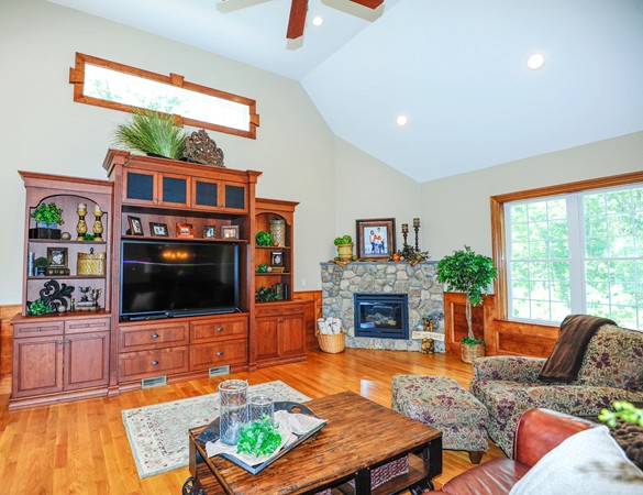 26 Cider Circle Bolton, MA 01740 - Photo 10 of 30 a living room with furniture fireplace and flat screen tv