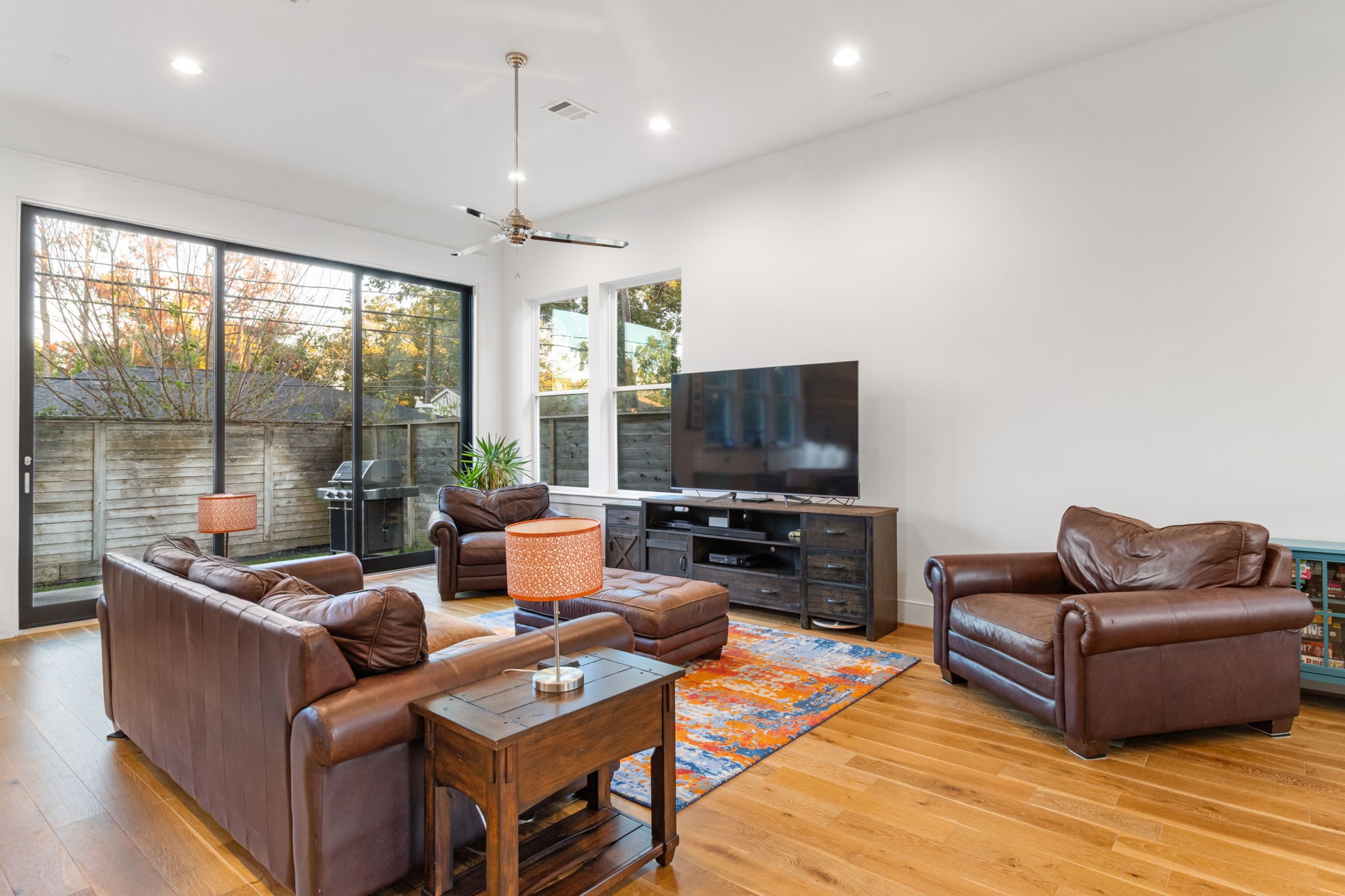 3302 Cardinal Crest Lane Houston, TX 77080 - Photo 11 of 46 a living room with furniture and a flat screen tv