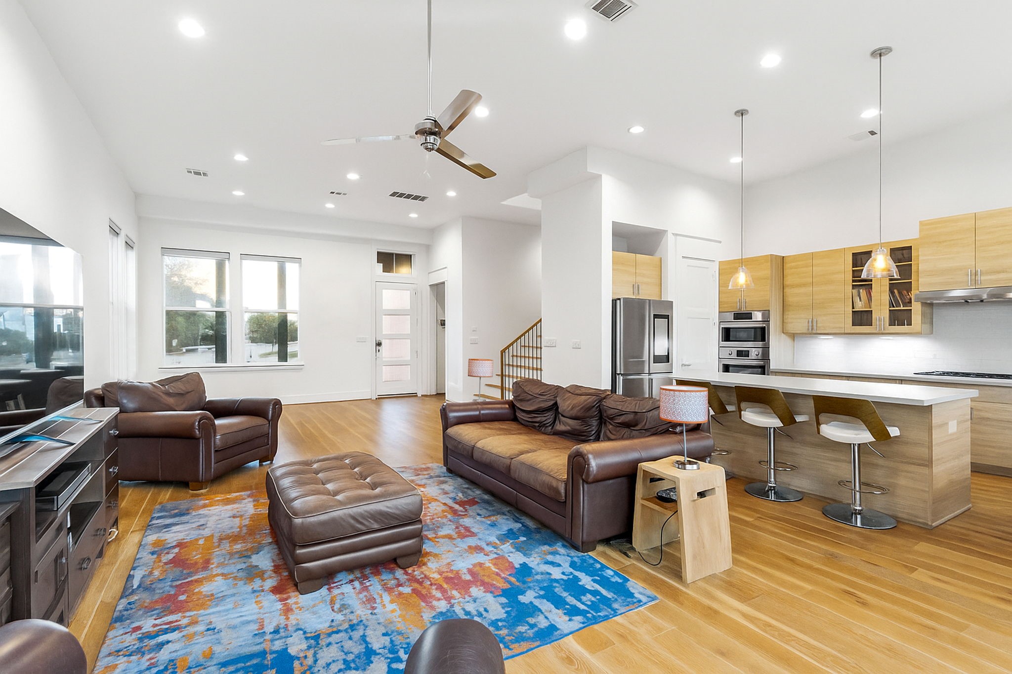 3302 Cardinal Crest Lane Houston, TX 77080 - Photo 13 of 46 a living room filled with furniture and a wooden floor