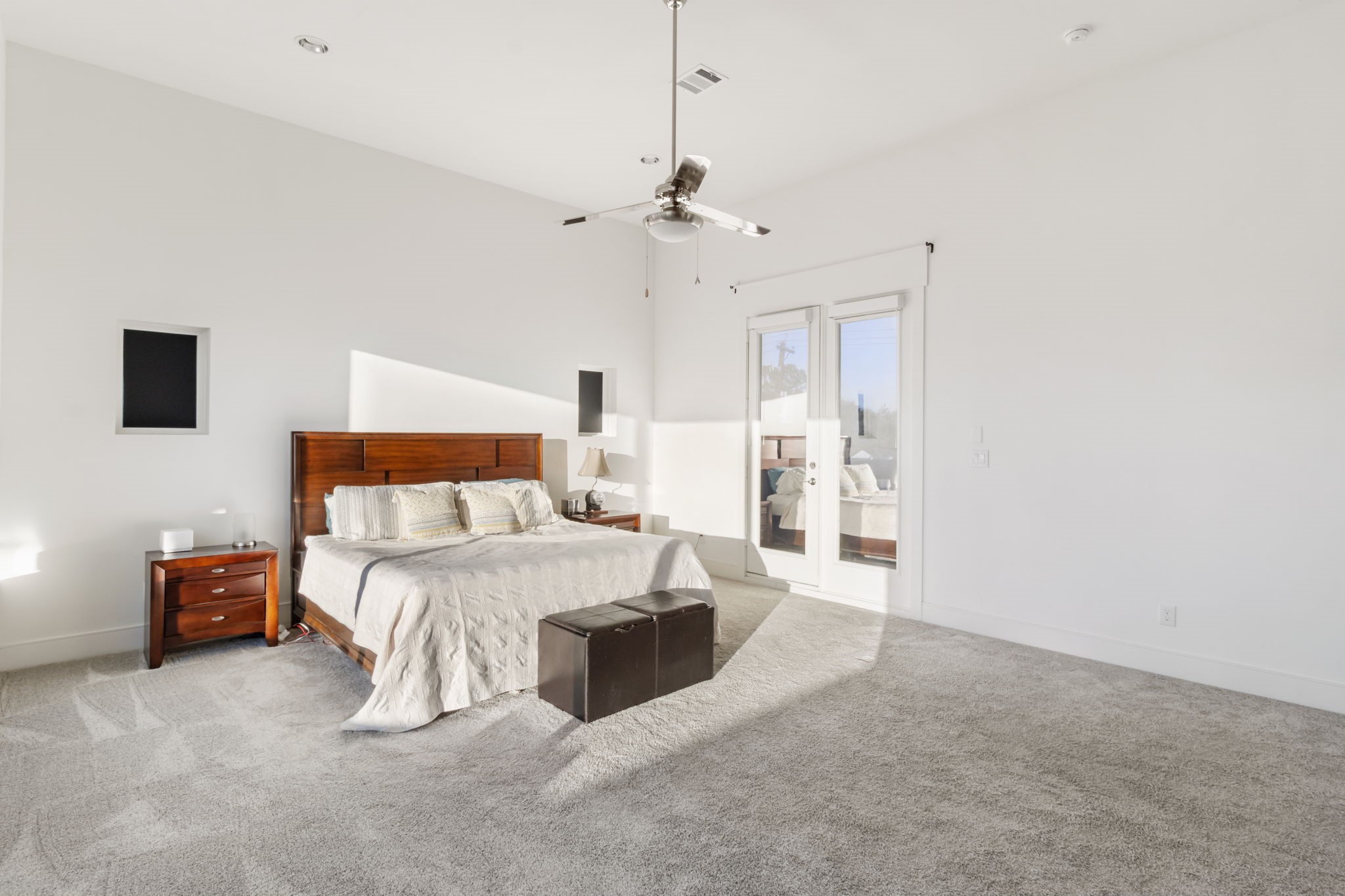 3302 Cardinal Crest Lane Houston, TX 77080 - Photo 23 of 46 a bedroom with a bed and a chandelier