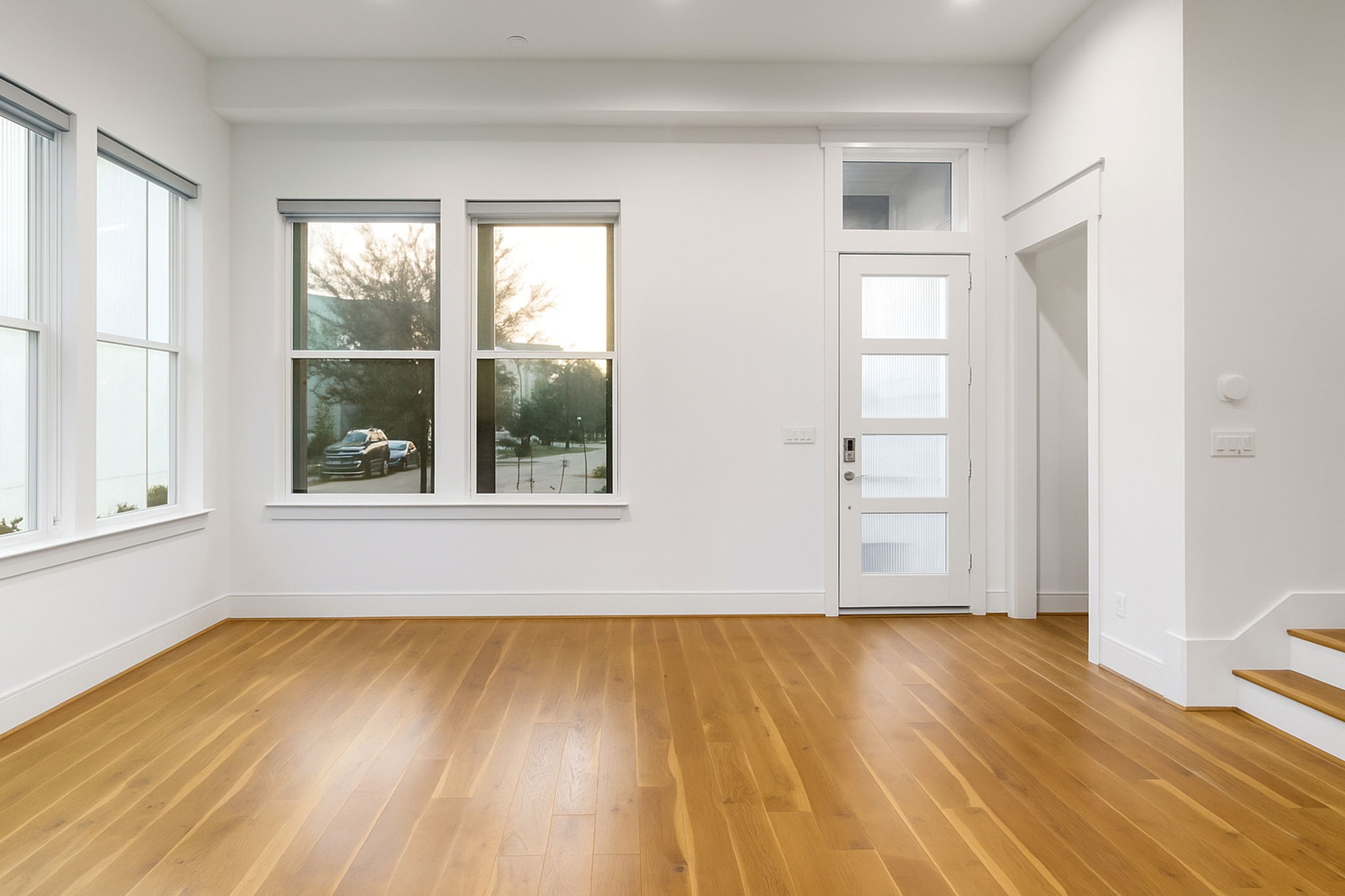 3302 Cardinal Crest Lane Houston, TX 77080 - Photo 4 of 46 an empty room with wooden floor and windows