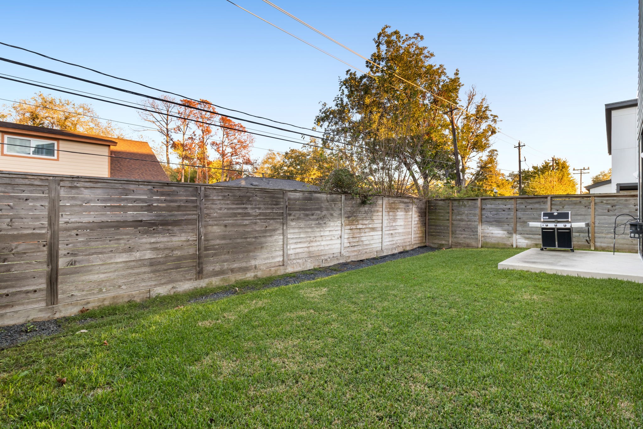 3302 Cardinal Crest Lane Houston, TX 77080 - Photo 41 of 46 a view of a backyard with plants and a lake view