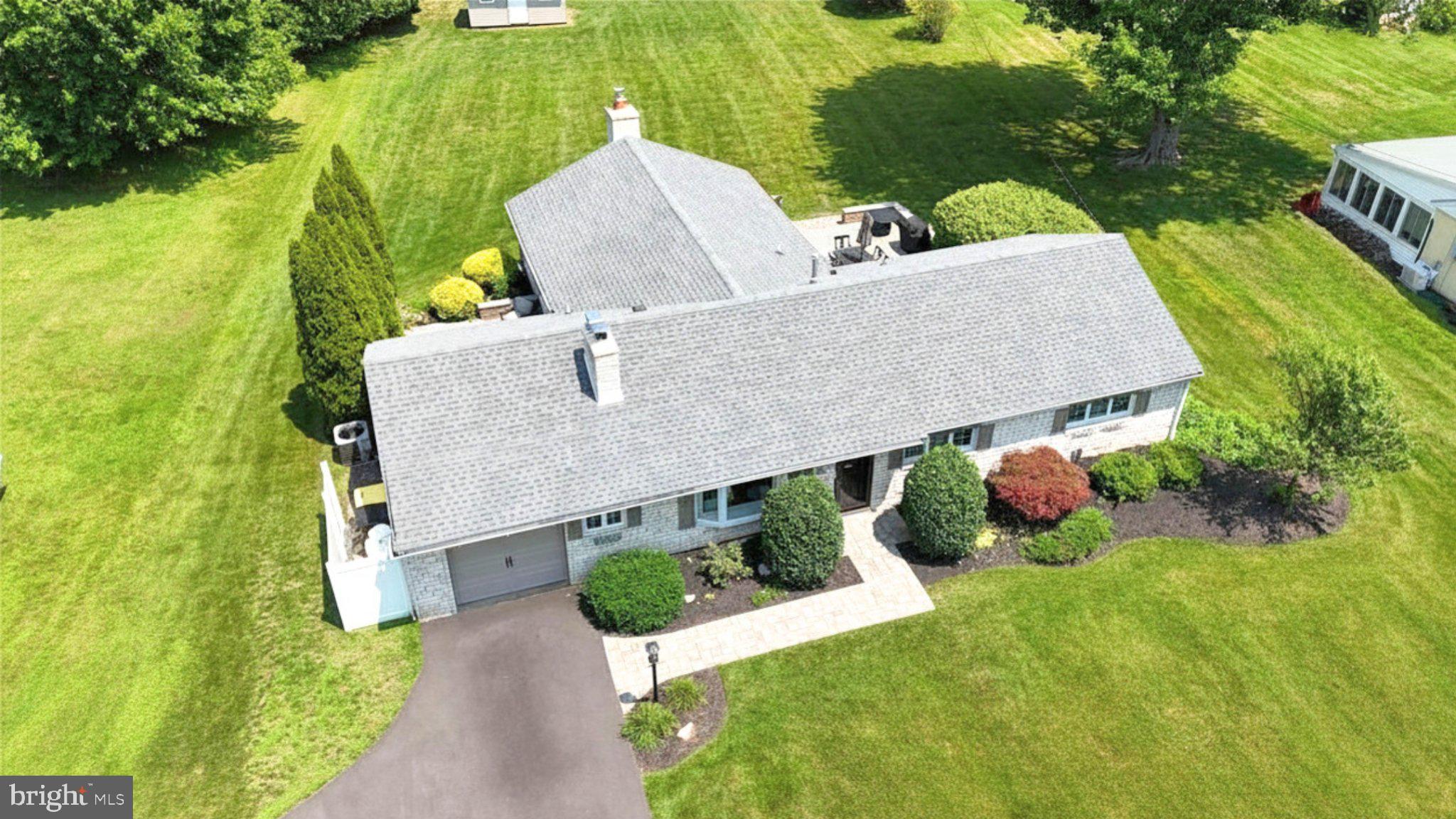 1121 West Thomas Road Lansdale, PA 19446 - Photo 2 of 9 Charming home nestled in lush greenery.