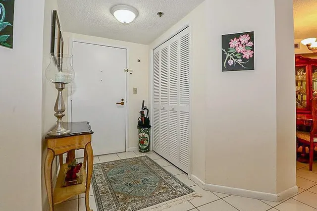 a view of a hallway with elevator