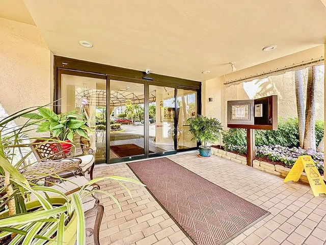 a view of swimming pool with a patio