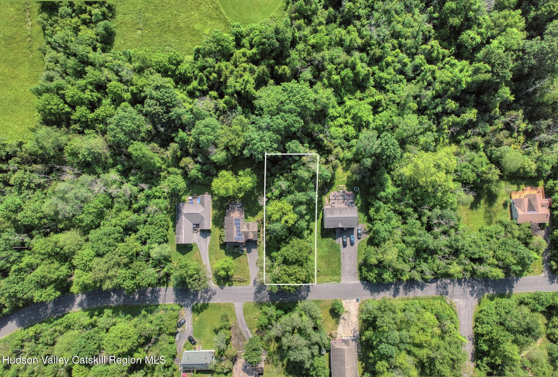 986 Sleepy Hollow Road Coxsackie, NY 12015 - Photo 4 of 7 an aerial view of residential house with outdoor space and trees all around