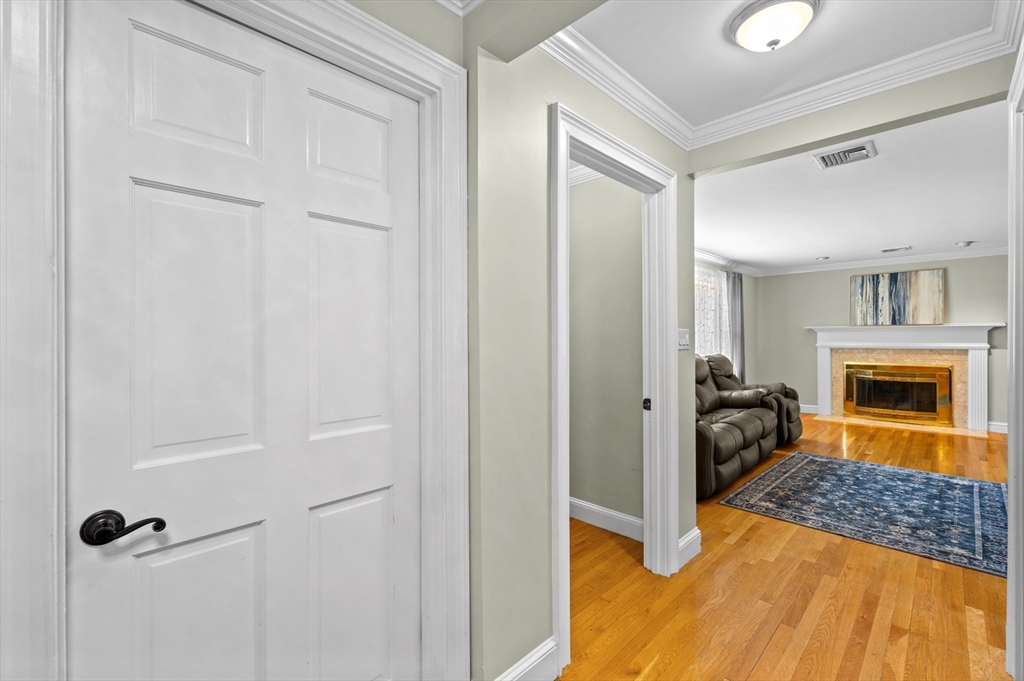 2 Herbert Road Worcester, MA 01602 - Photo 7 of 33 a view of a livingroom with a fireplace bathroom and front door