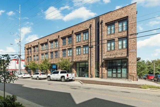 a front view of a building with street view