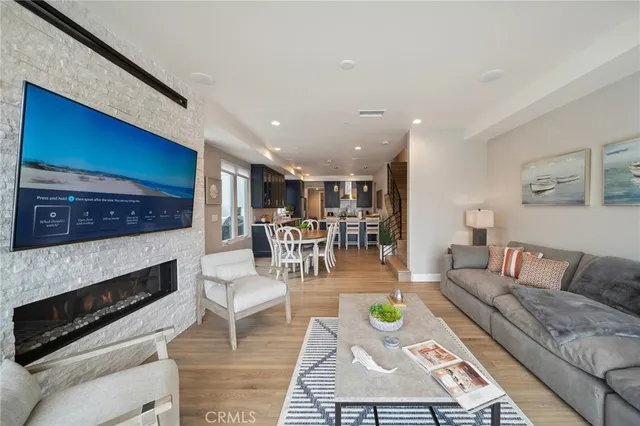 a kitchen with stainless steel appliances a sink stove and cabinets