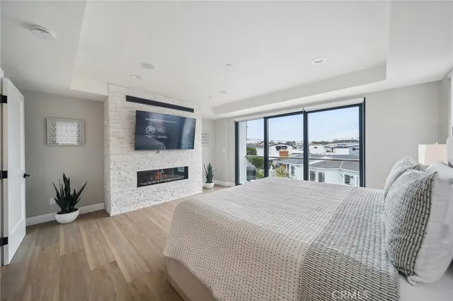 a bed room with a bed and a television