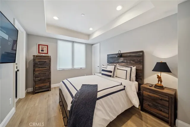 a bathroom with a sink vanity mirror and toilet