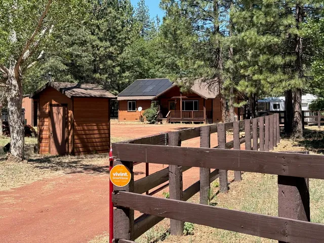 a view of a house with large windows