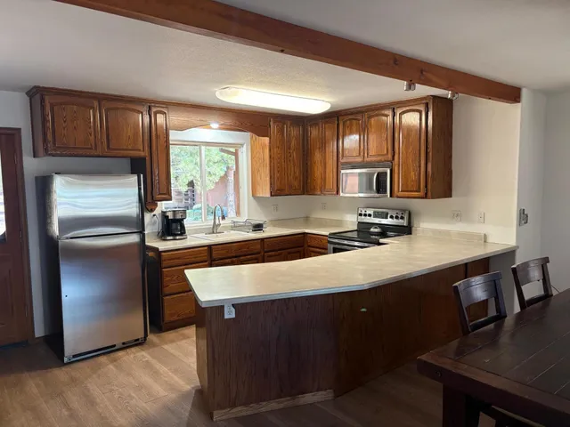 a view of a closet area with an empty room
