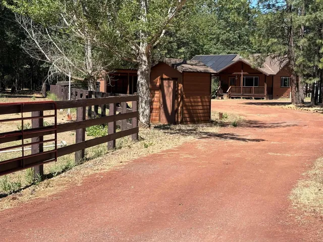 a backyard of a house with seating space