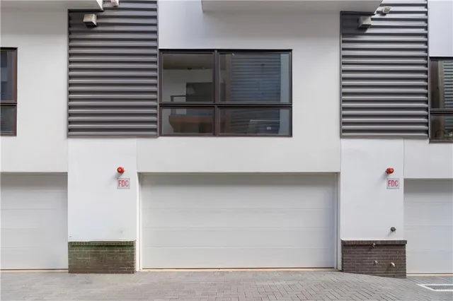 a bathroom with a sink and a shower