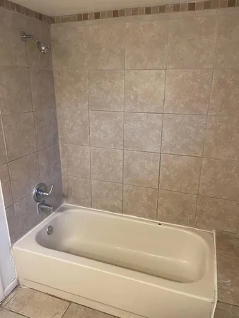 a bathroom with a bathtub