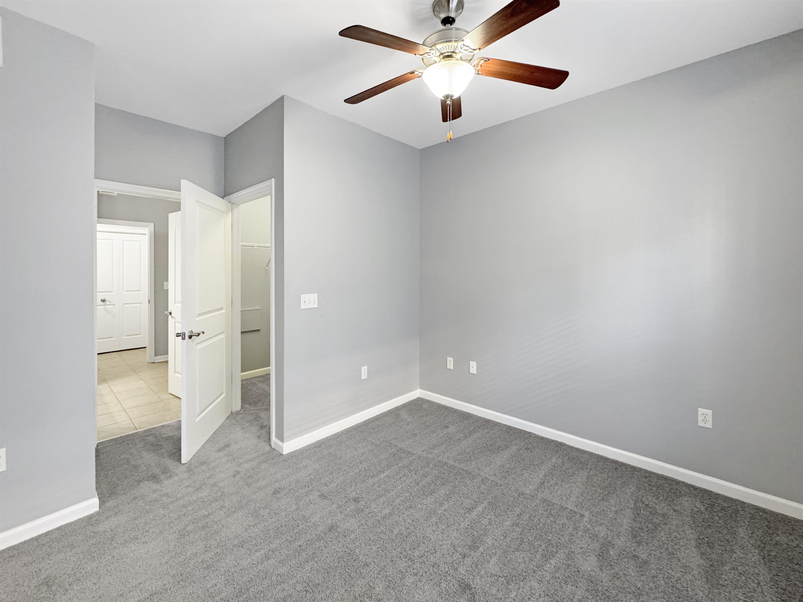 665 Tennessee Street, Unit 306 Memphis, TN 38103 - Photo 23 of 35 wooden floor in an empty room and a bathroom