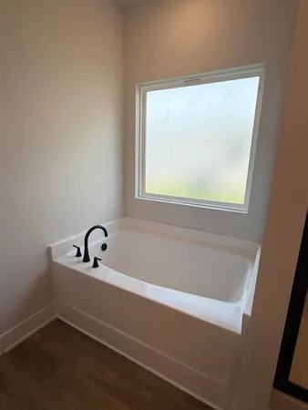 a bathroom with a bathtub