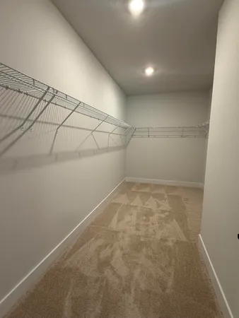 a view of a room with an empty space