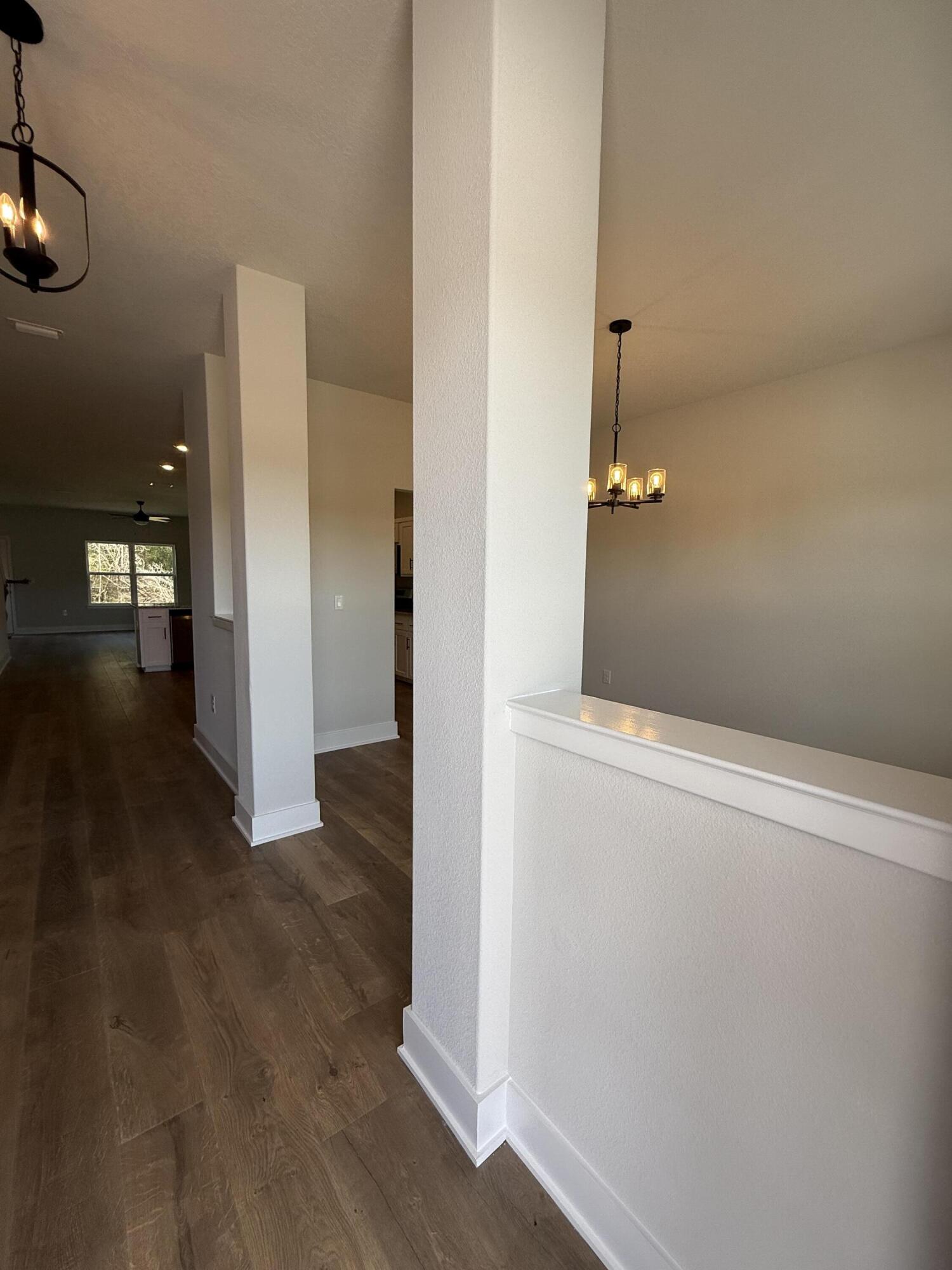 2410 Aleia Lane Crestview, FL 32536 - Photo 35 of 37 wooden floor in an empty room