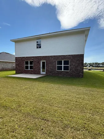 a view of a house with a lake view