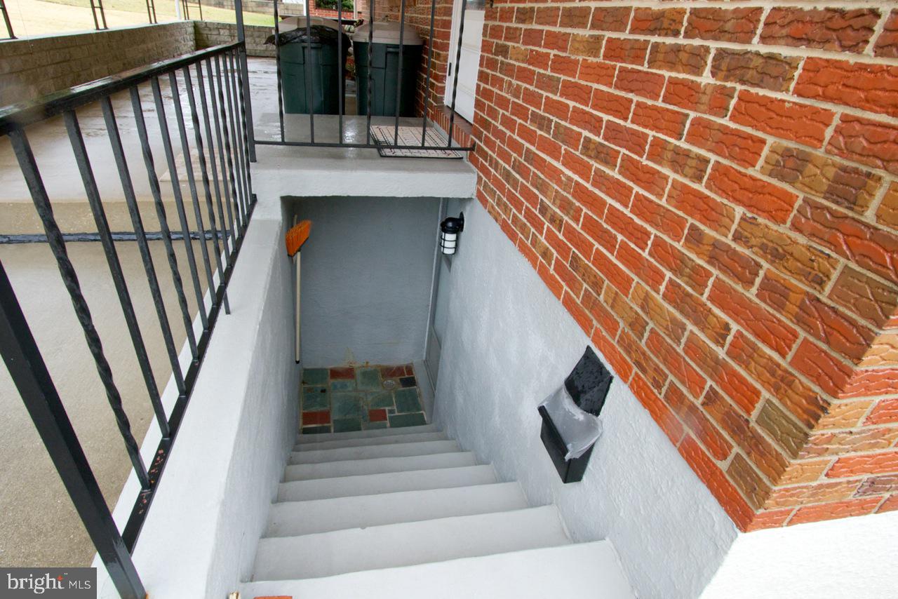 8110 Woodhaven Road Baltimore, MD 21237 - Photo 19 of 25 Stairs Leading To Basement Lower level.