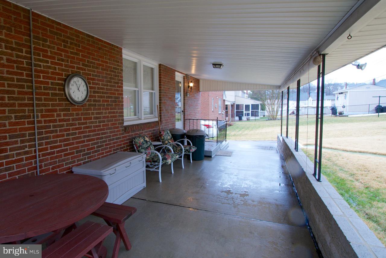 8110 Woodhaven Road Baltimore, MD 21237 - Photo 21 of 25 ~View~ Patio. Pull down Sun Screens~ & Furniture