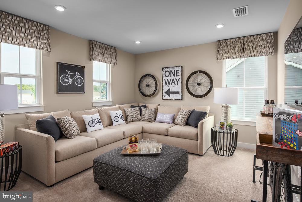 2475 Morgan Run Huntingdon Valley, PA 19006 - Photo 11 of 14 a living room with furniture a clock on wall and a window