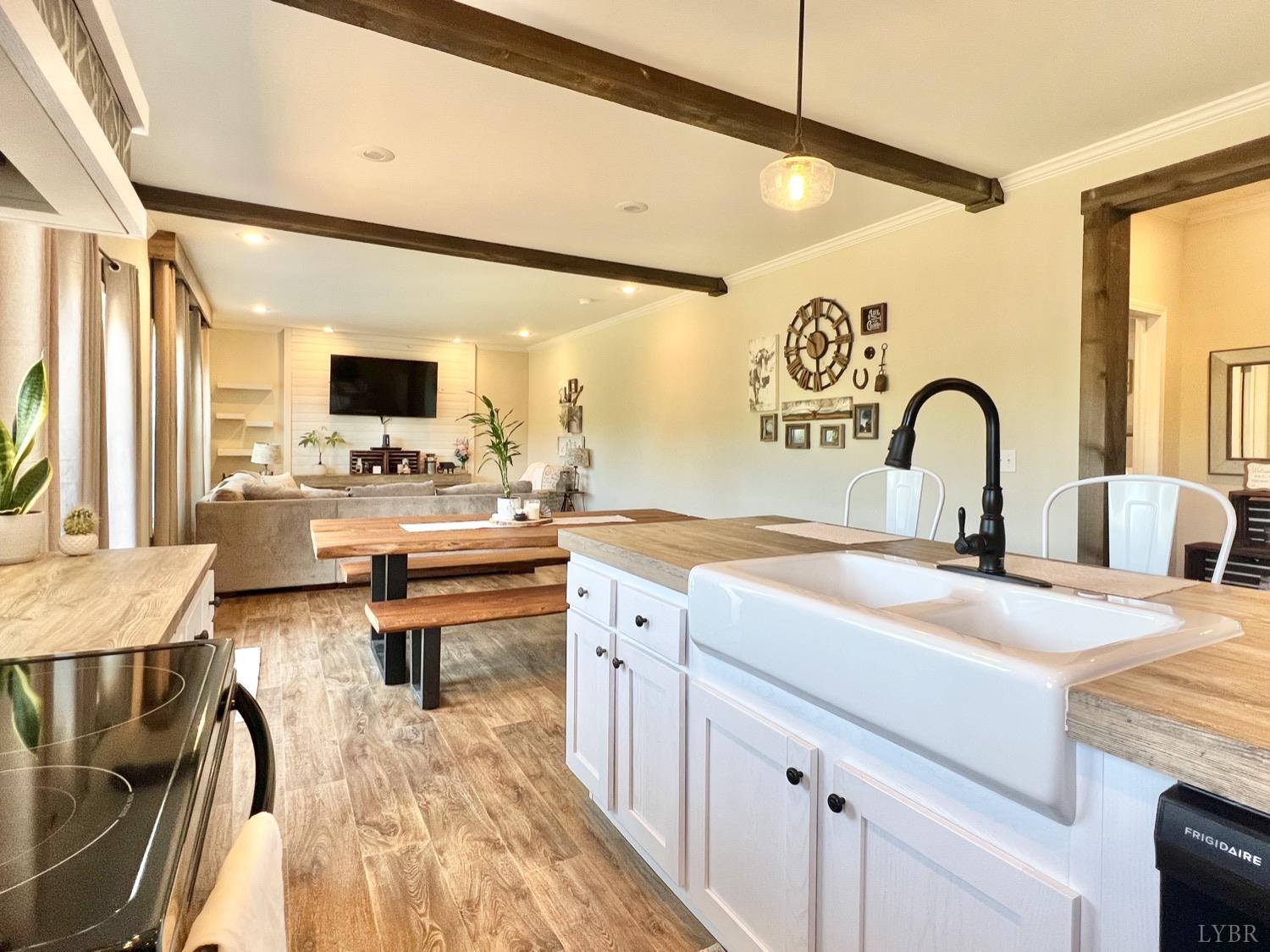 2747 Five Forks Road Bedford, VA 24523 - Photo 15 of 40 a spacious bedroom with a bed and a flat screen tv