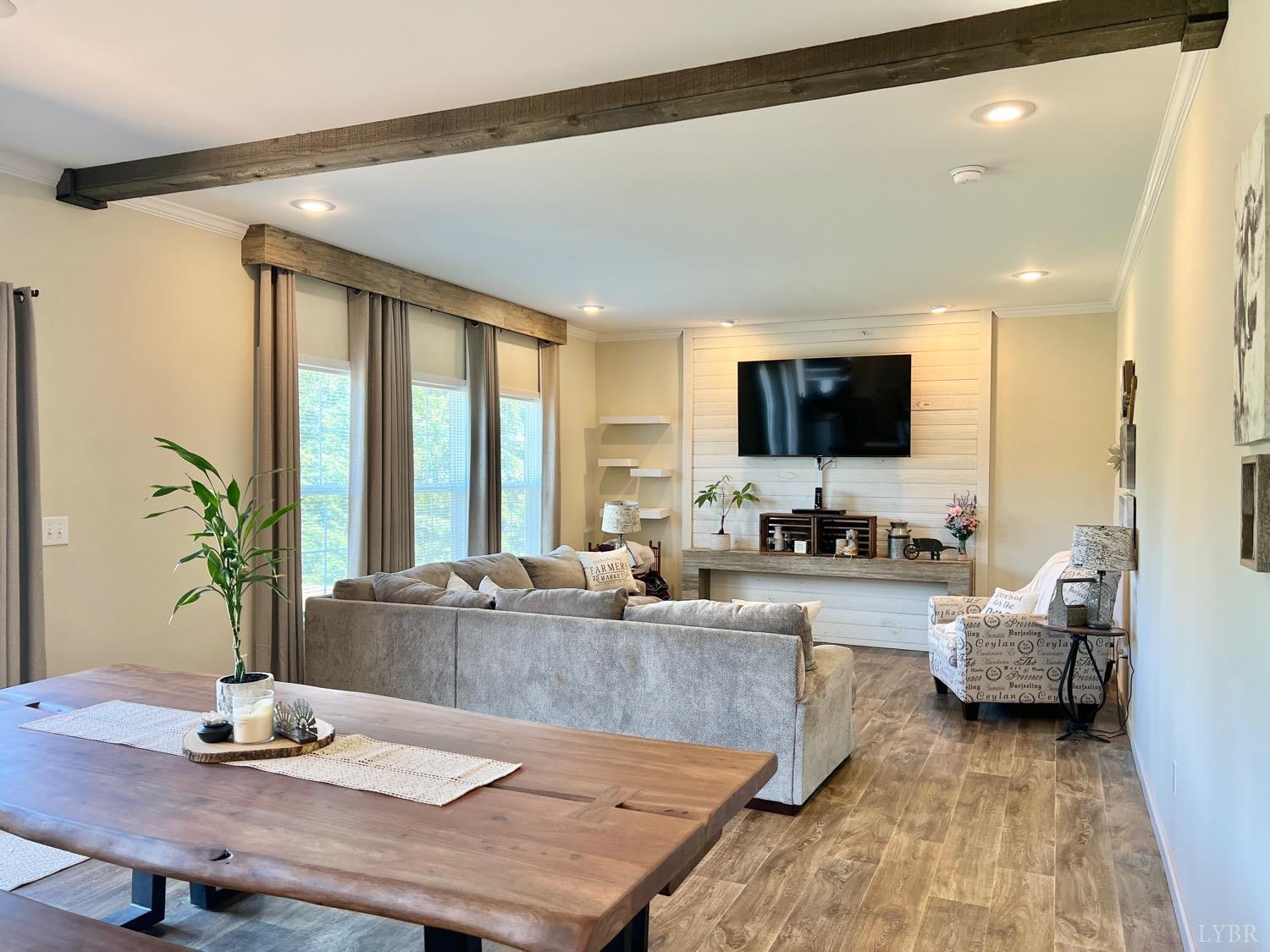 2747 Five Forks Road Bedford, VA 24523 - Photo 17 of 40 a living room with furniture and a flat screen tv
