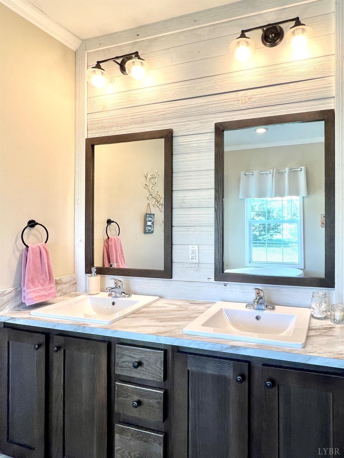2747 Five Forks Road Bedford, VA 24523 - Photo 24 of 40 a bathroom with a granite countertop sink and a mirror