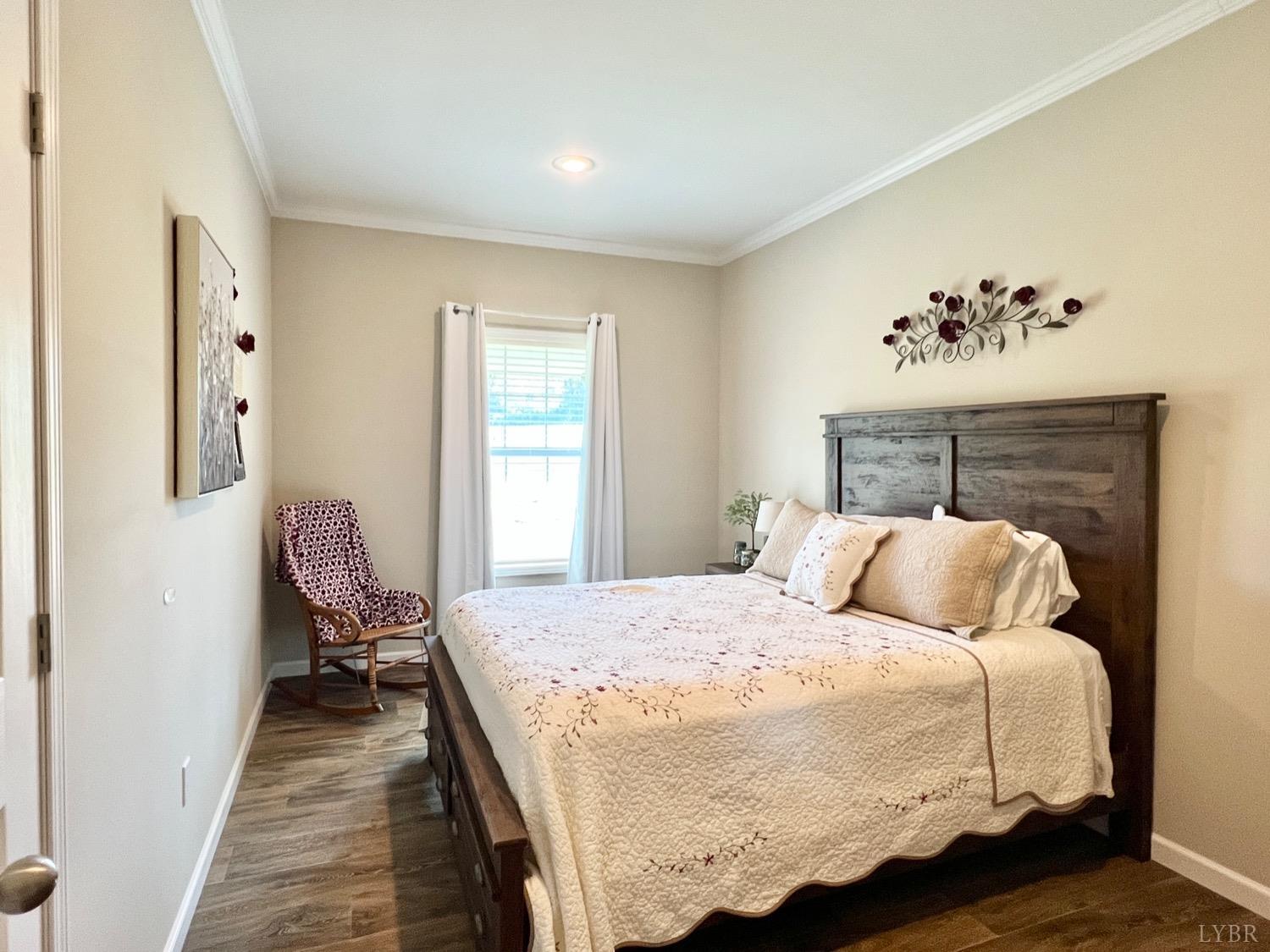 2747 Five Forks Road Bedford, VA 24523 - Photo 29 of 40 a bedroom with a bed and wooden floor