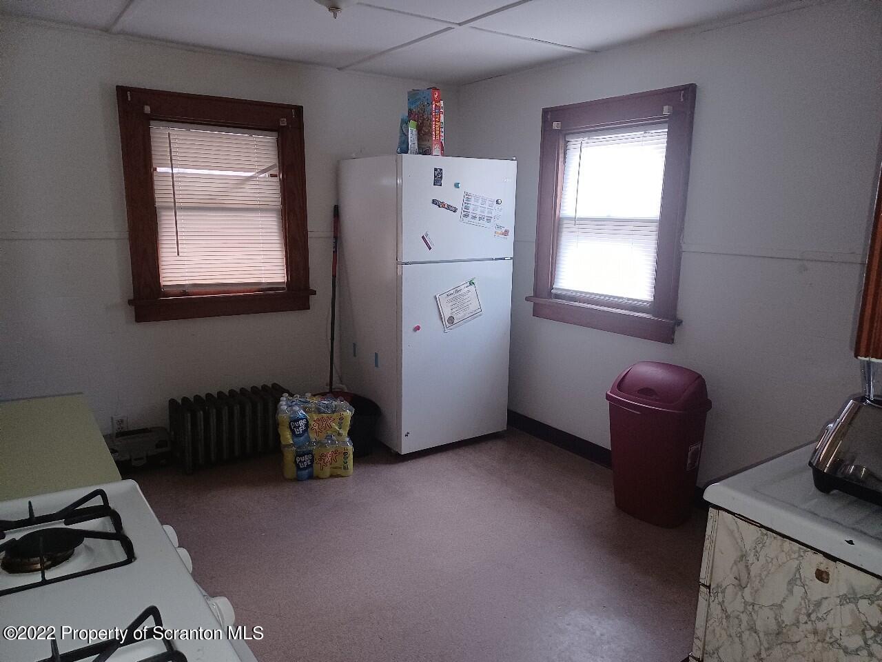 415 Maple Street Scranton, PA 18505 - Photo 17 of 22 a room with a window and gym equipment