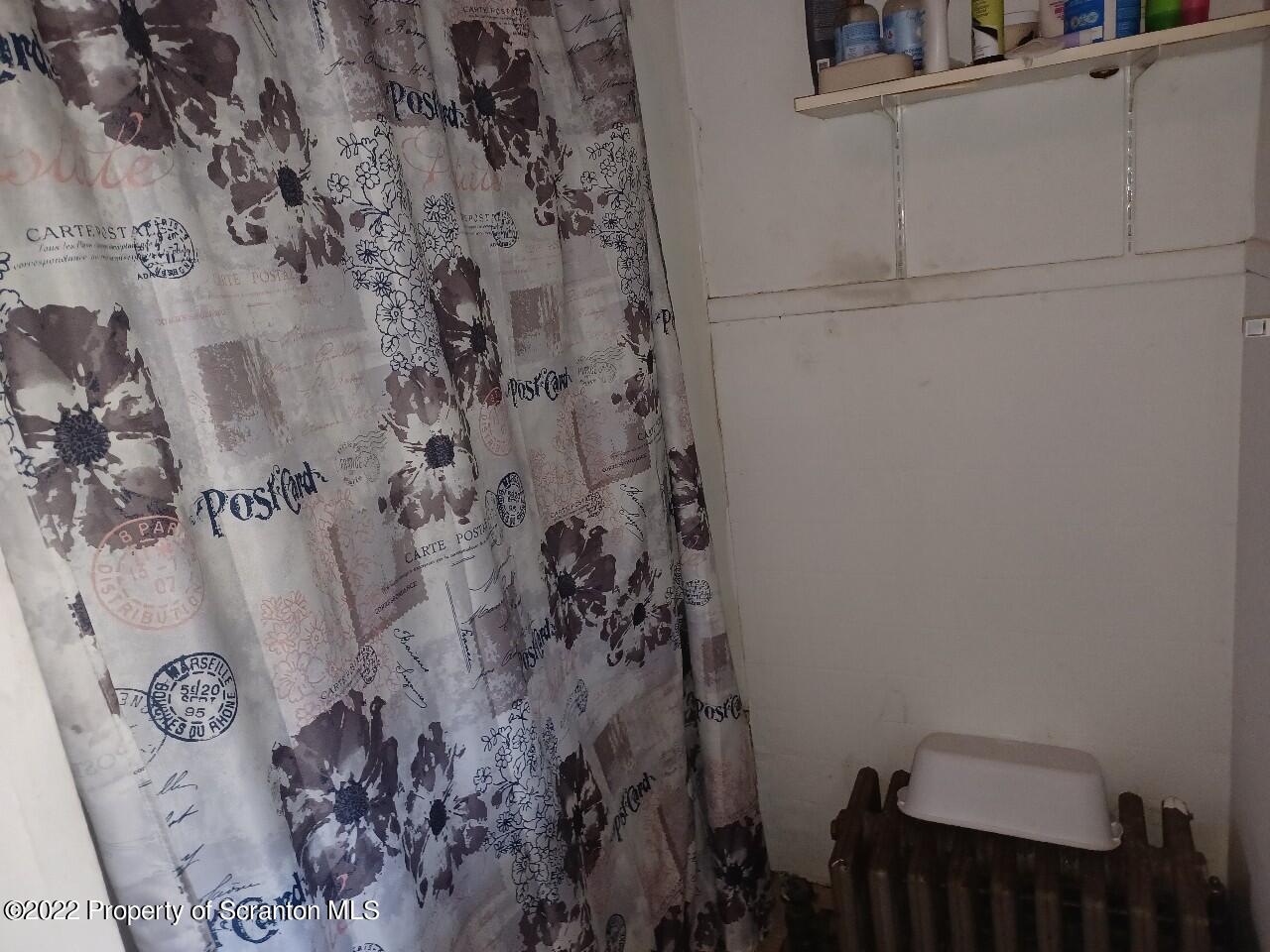 415 Maple Street Scranton, PA 18505 - Photo 19 of 22 a bathroom with a shower