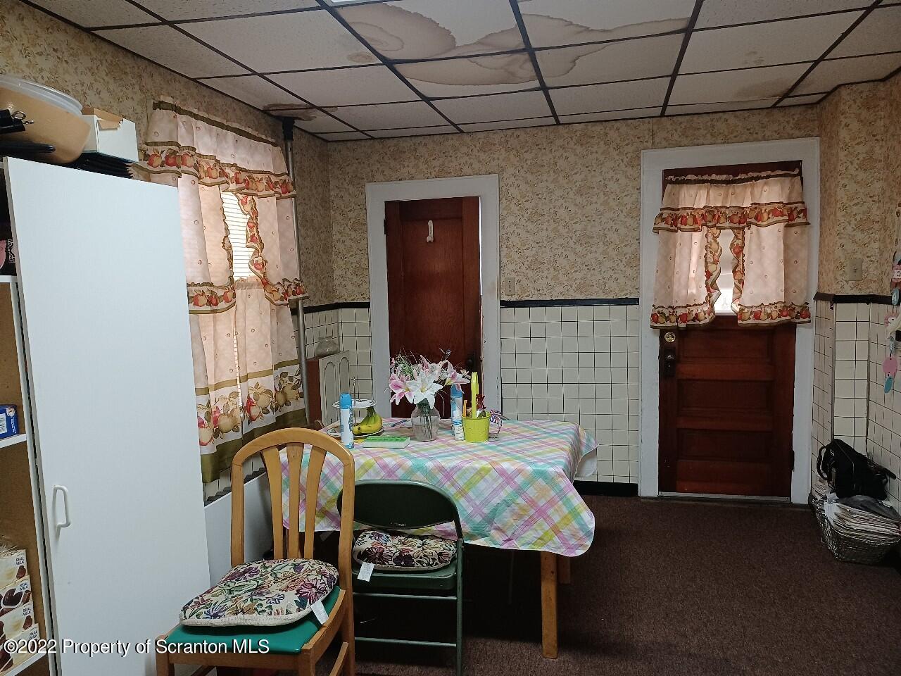 415 Maple Street Scranton, PA 18505 - Photo 4 of 22 a living room with furniture and a window