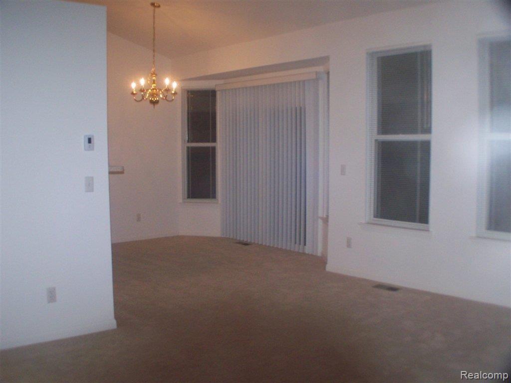 70 Eagle Ridge Road Lake Orion, MI 48360 - Photo 5 of 17 View of livingroom and dining ar
