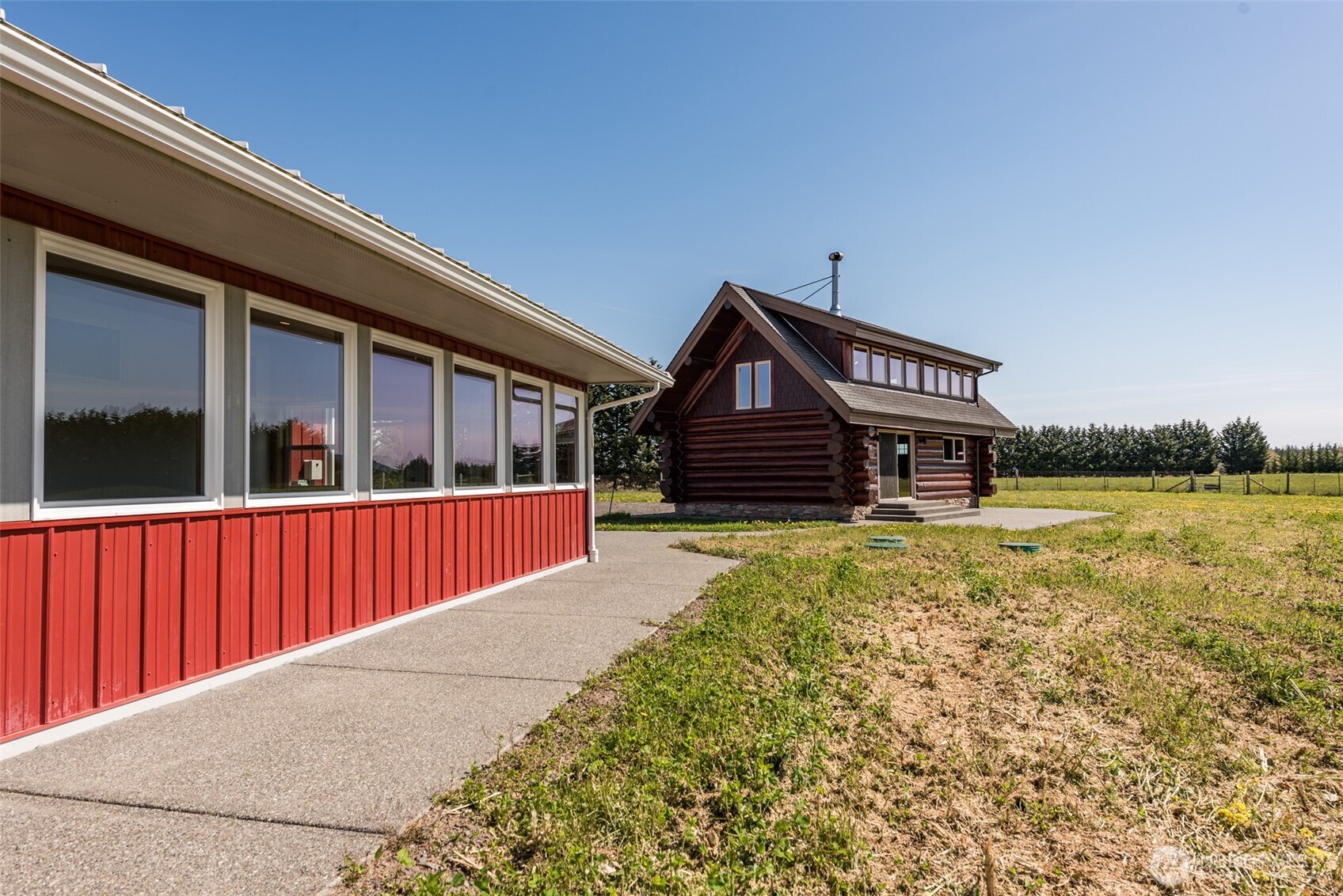 71 Shepherds Way Sequim, WA 98382 - Photo 23 of 39 a front view of a house with balcony