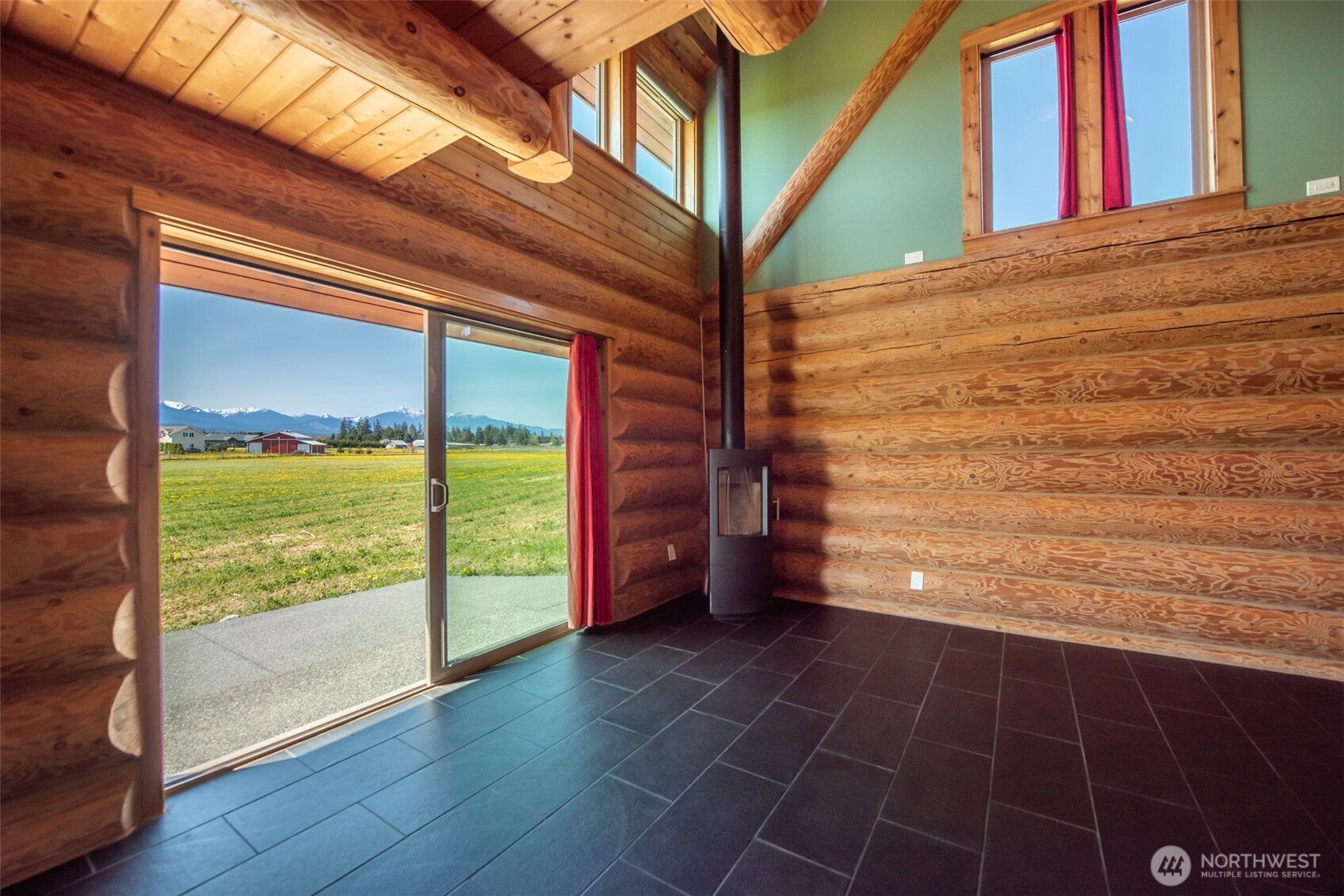 71 Shepherds Way Sequim, WA 98382 - Photo 25 of 39 a view of a room with wooden floor and iron stairs