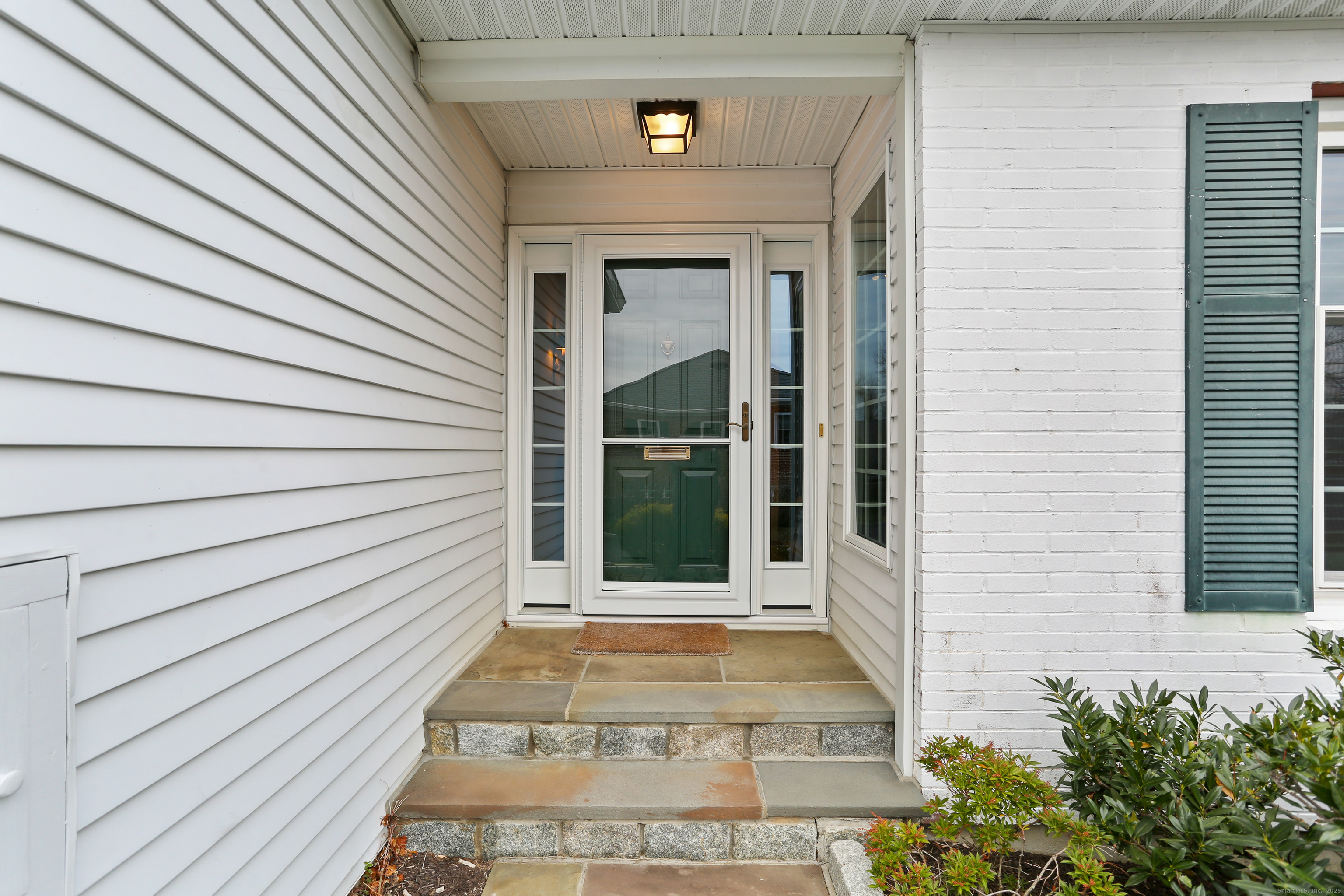 47 Bank Street, Unit 47 New Canaan, CT 06840 - Photo 2 of 40 a view of a door of the house