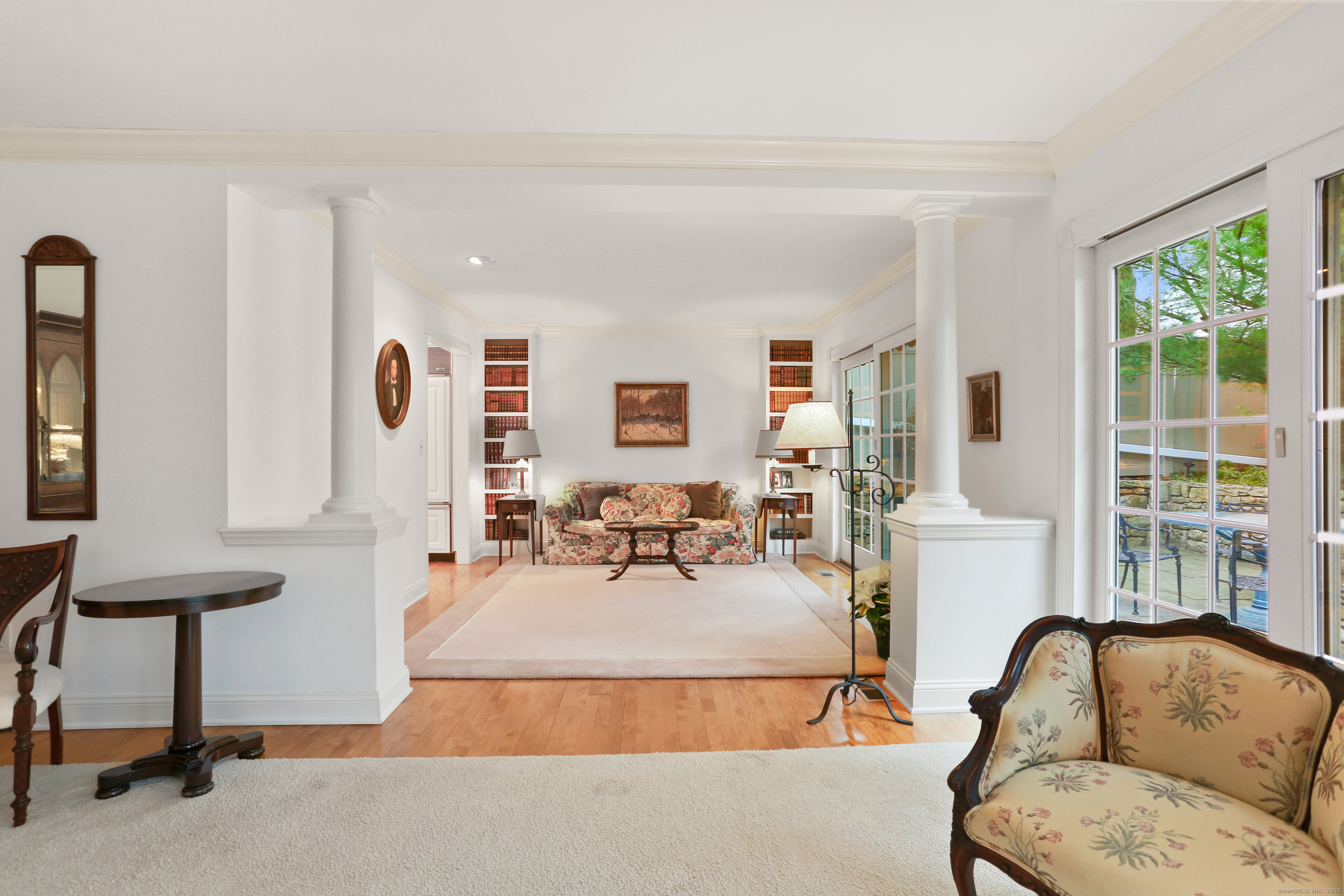 47 Bank Street, Unit 47 New Canaan, CT 06840 - Photo 26 of 40 a living room with furniture and a large window