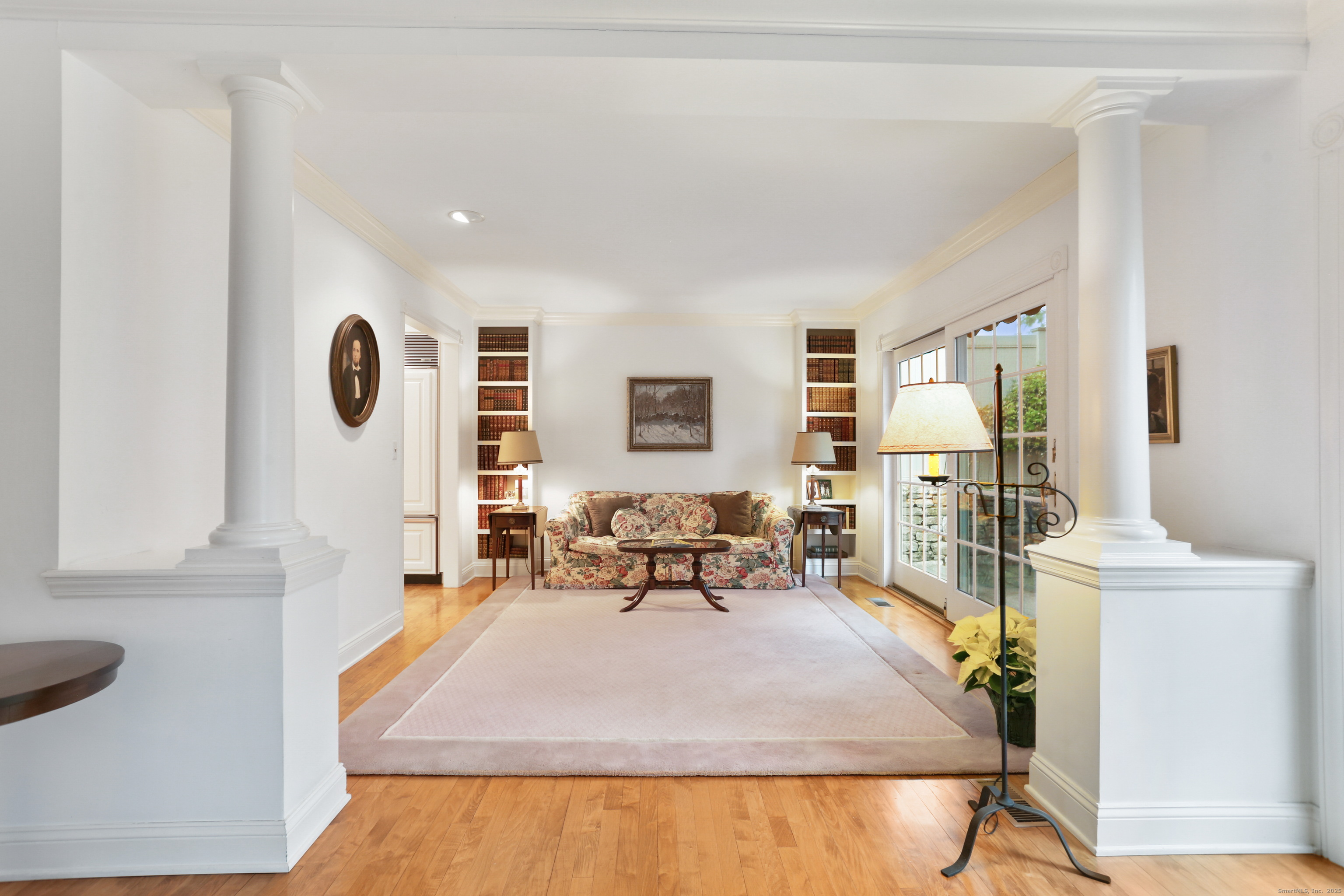 47 Bank Street, Unit 47 New Canaan, CT 06840 - Photo 28 of 40 a bed room with a bed and a table