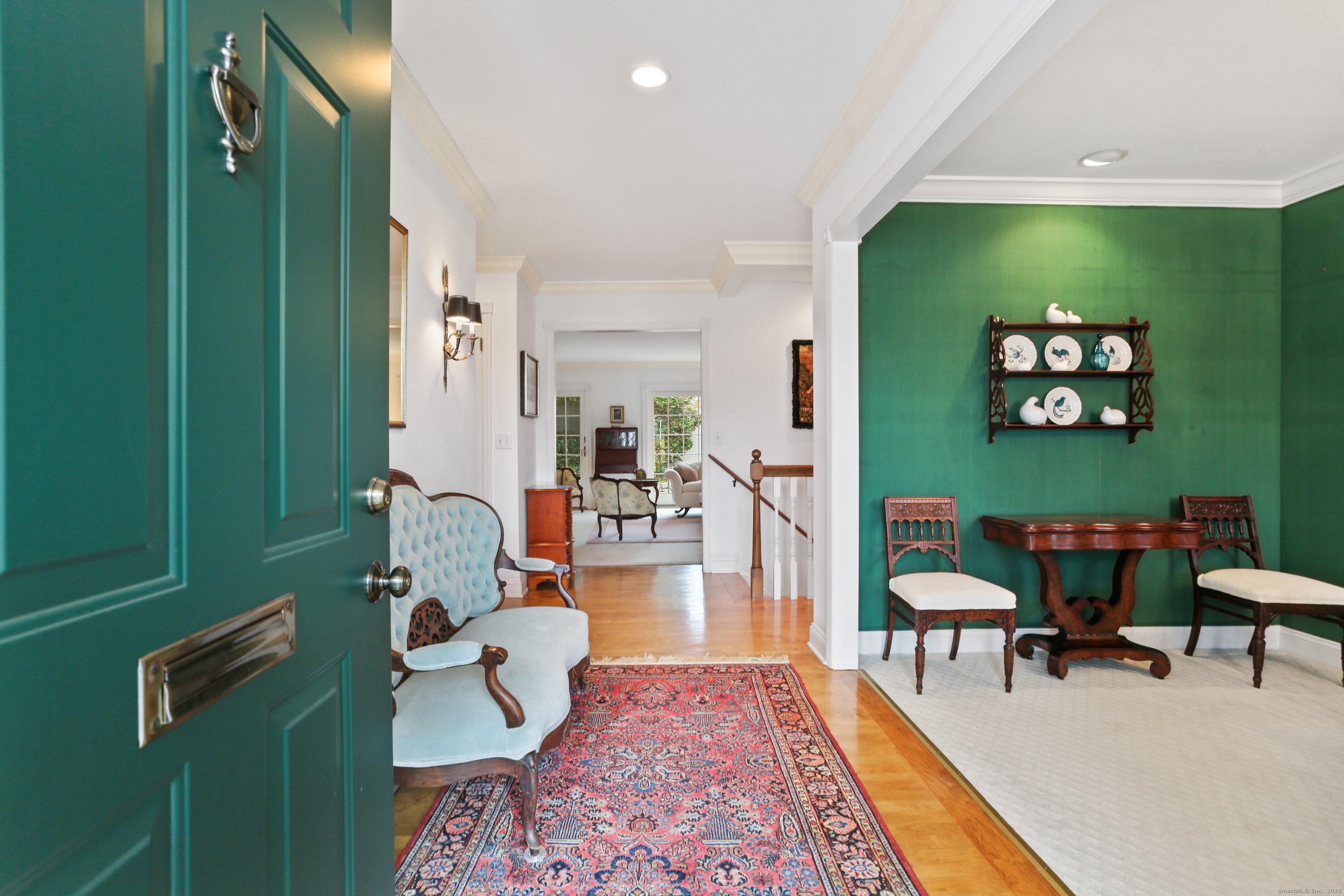 47 Bank Street, Unit 47 New Canaan, CT 06840 - Photo 3 of 40 a living room with furniture and a flat screen tv