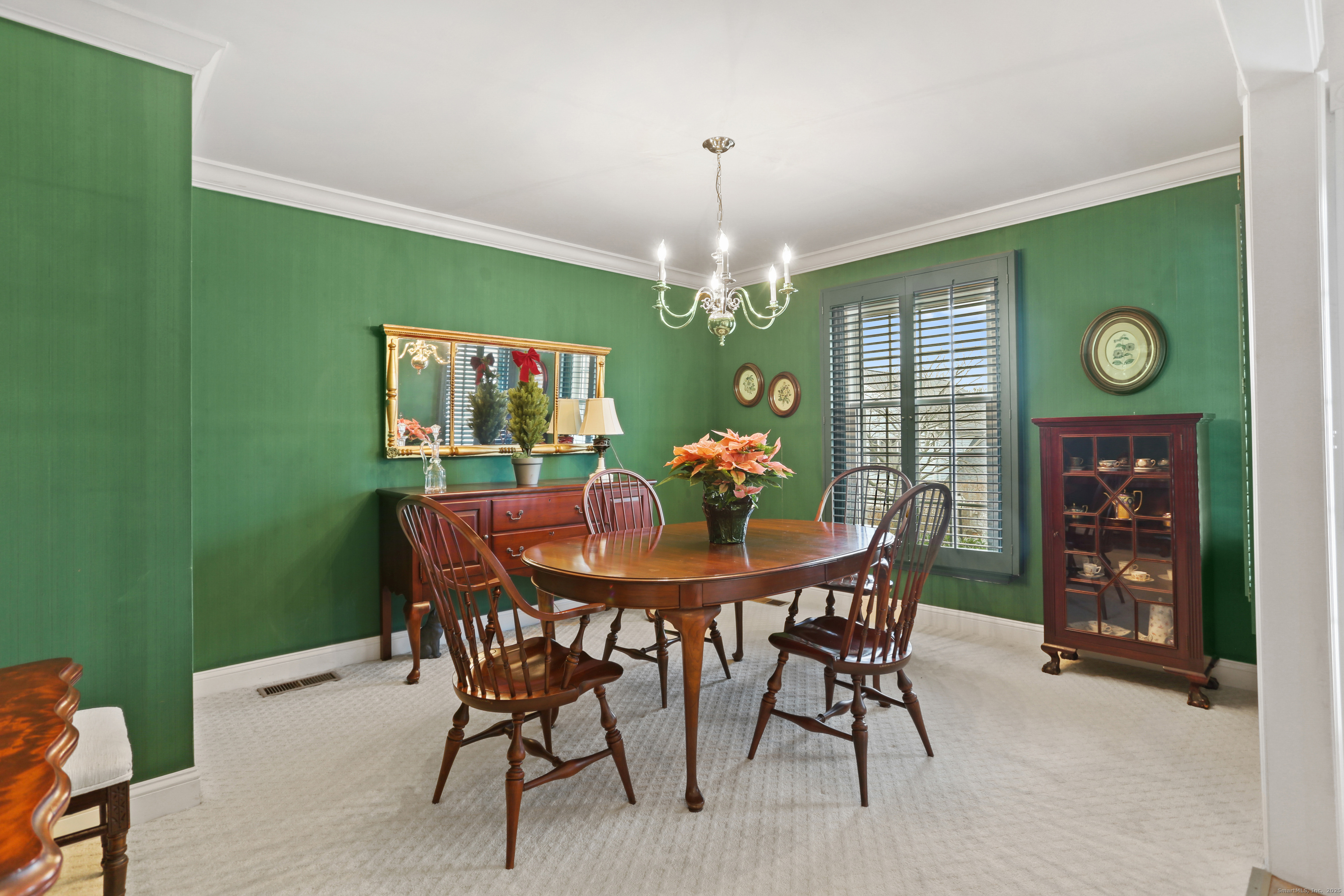 47 Bank Street, Unit 47 New Canaan, CT 06840 - Photo 8 of 40 a dining room with furniture and window