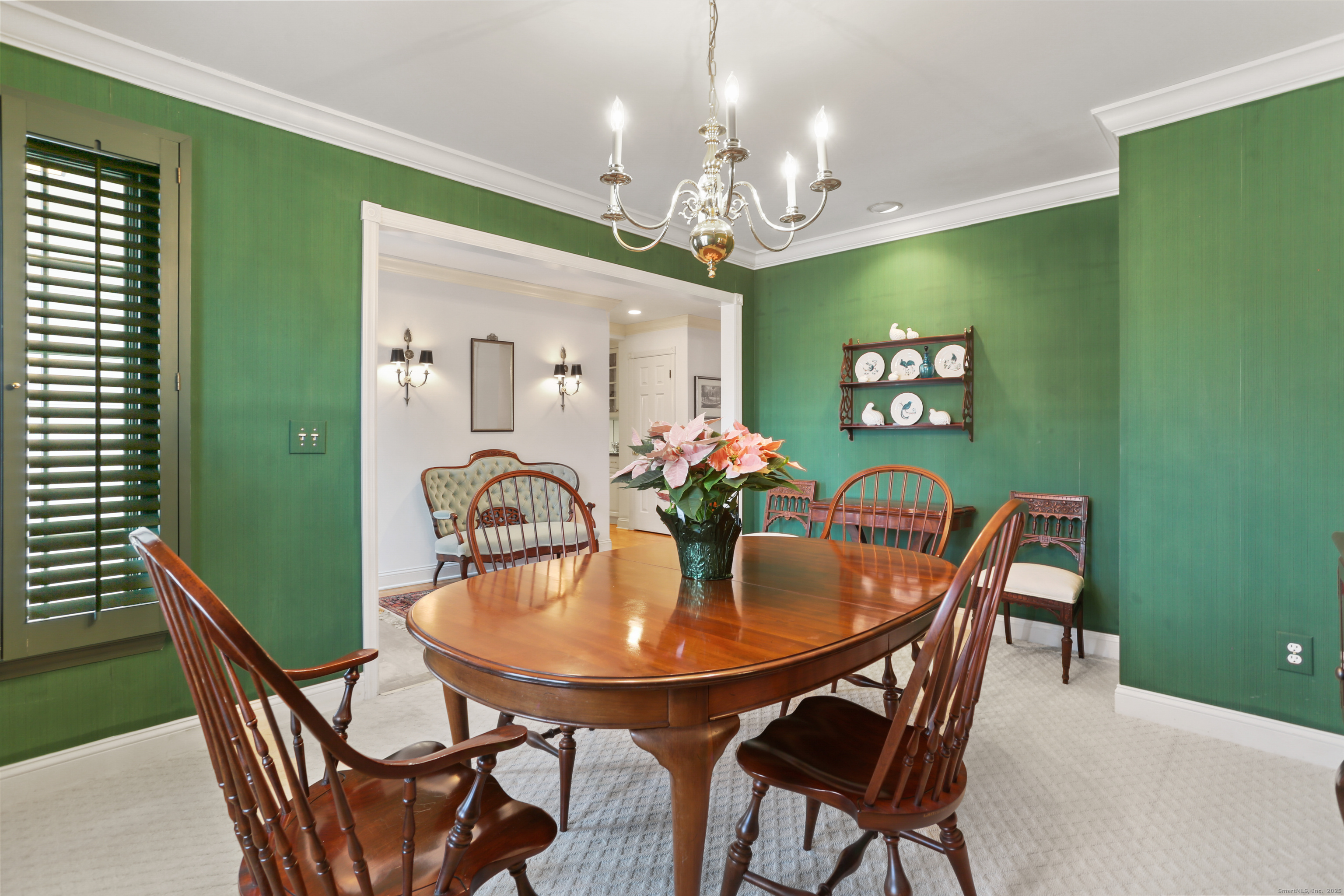 47 Bank Street, Unit 47 New Canaan, CT 06840 - Photo 10 of 40 a dining room with furniture a livingroom and wooden floor