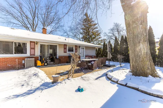a view of a backyard with a patio
