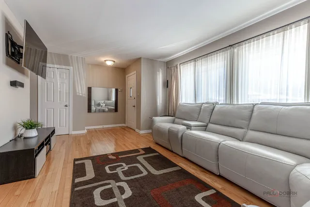 a living room with a couch and a table