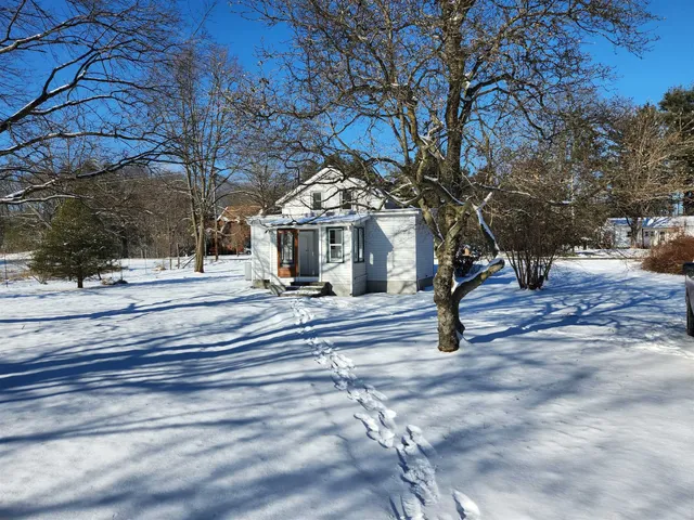 a view of a building with trees