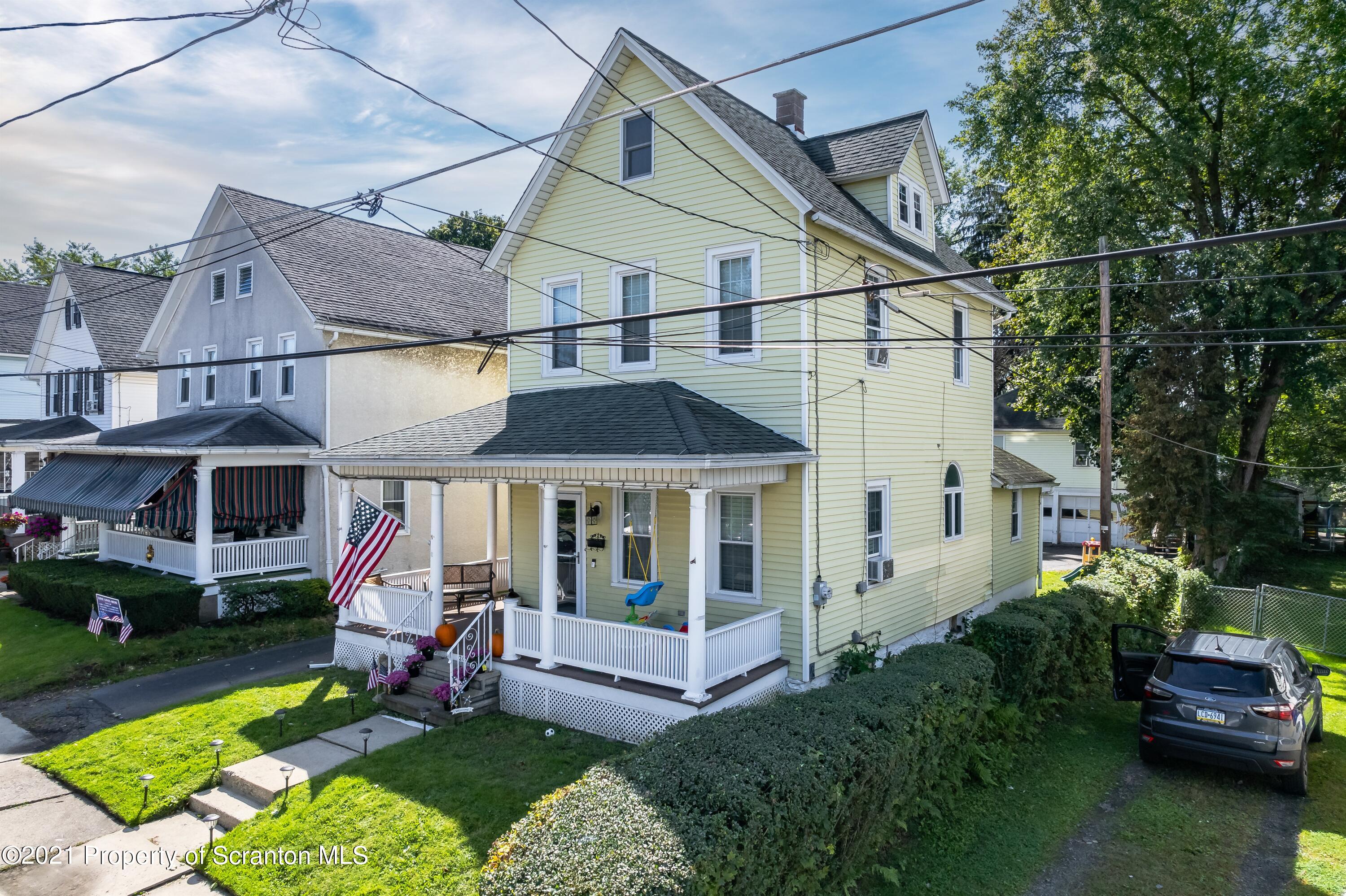 2016 Rigg Street Dunmore, PA 18512 - Photo 3 of 39 a view of a house with a yard and sitting area