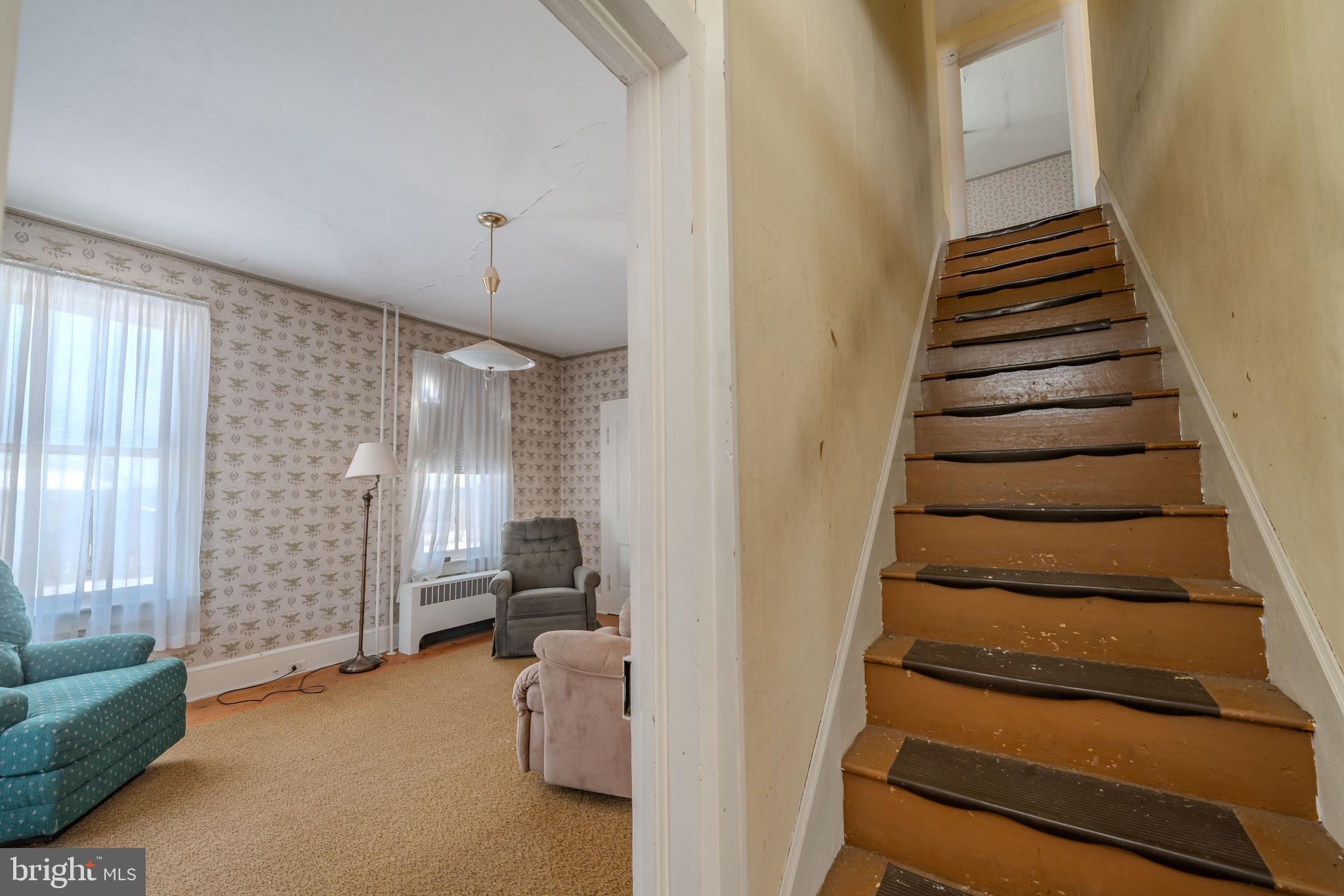 7606 Rose Valley Road Trout Run, PA 17771 - Photo 7 of 52 a view of entryway and hall with wooden floor